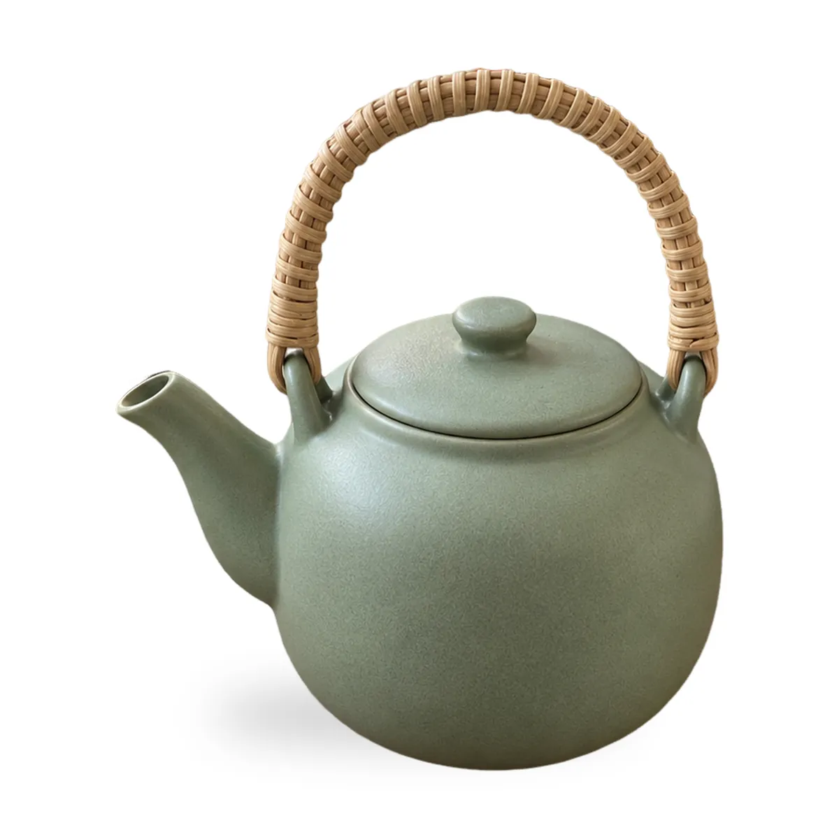 The same teapot cut out and centred on pure white with a soft shadow under it
